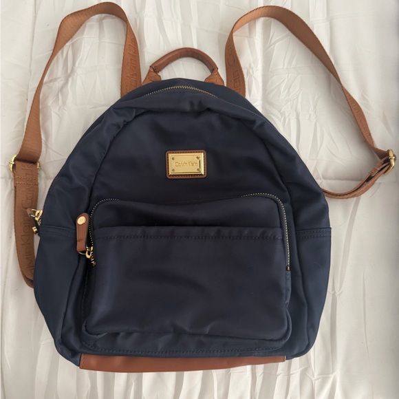 Calvin Klein Handbags - Calvin Klein Navy and Tan Backpack